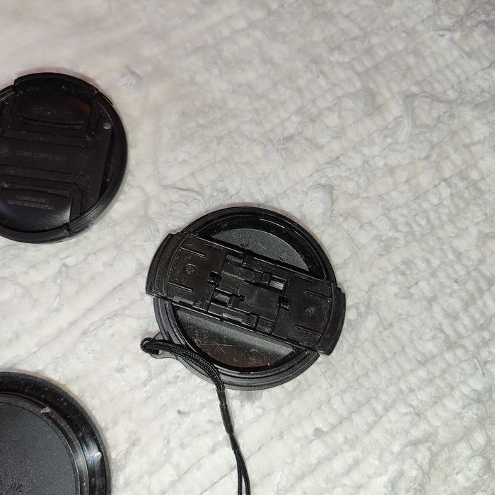 Tampa de lente _ objetiva Fuji Finepix e compatíveis