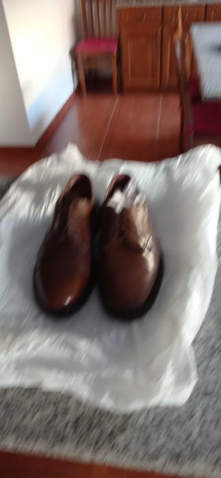 Diversos sapatos e ténis de marca