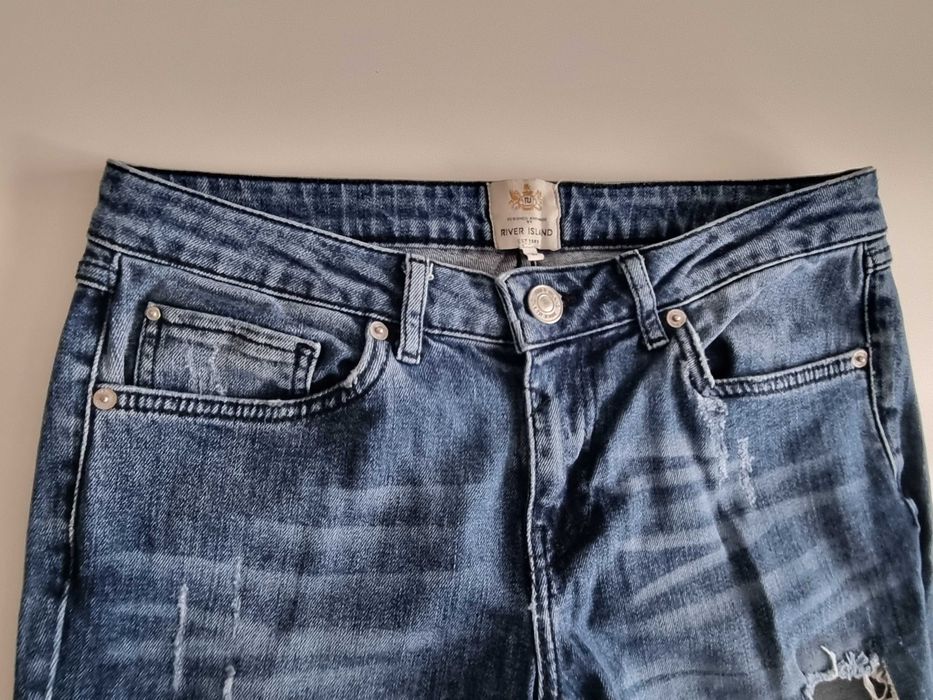 Spodnie z dziurami River Island 38(M)