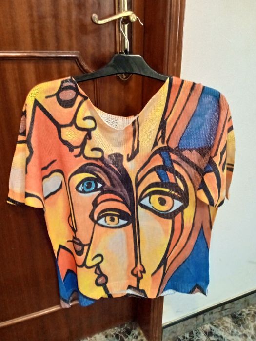 Roupa TAM XL em bom estado