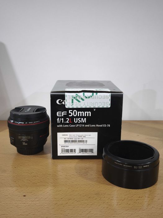 Objetiva Canon EF 50mm f/1.2L USM em excelente estado.