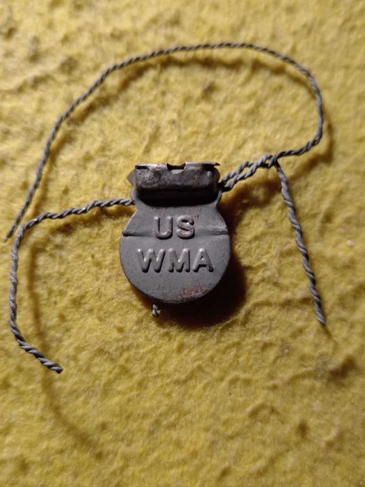 Старая свинцовая пломба.