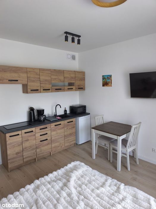 Lokal uzytkowy z tarasem i miejscem parkingowym Sunset Resort.