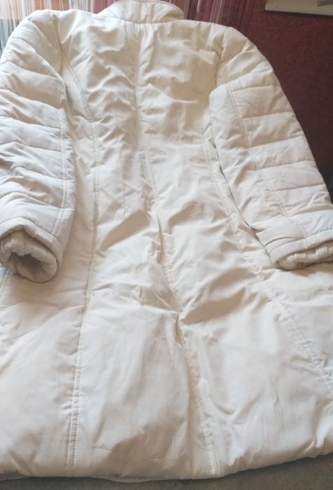 Женский пуховик .