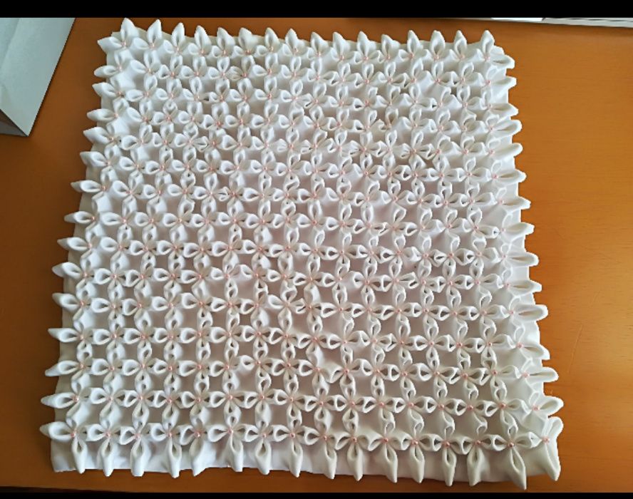 Manta favos de mel feita à mão por costureira para ovo de bebê.