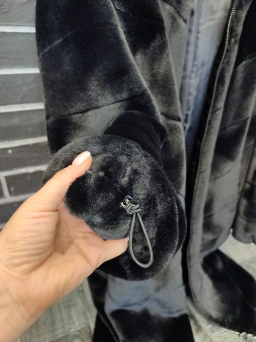 Шуба з штучного хутра.розмір м.в ідеальному стані