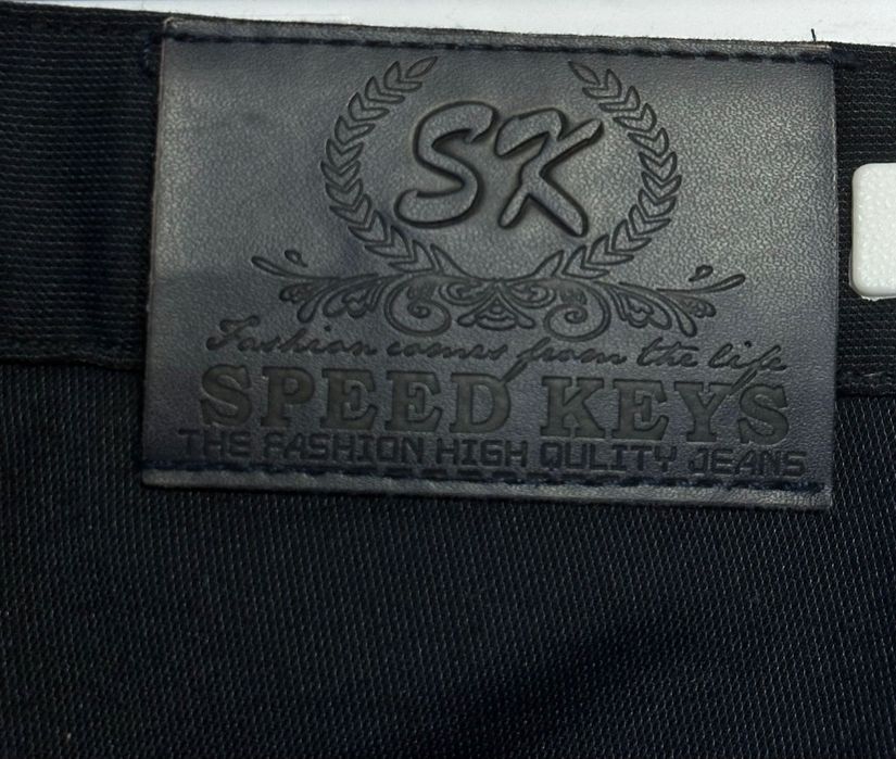 Spodnie garniturowe męskie W31 L34 S Speed Keys