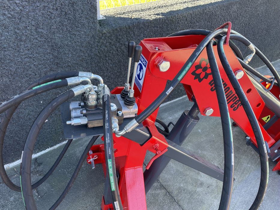 Carregador traseiro com comandos