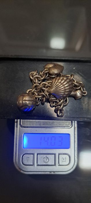 Pulseiras vintage em prata charms.