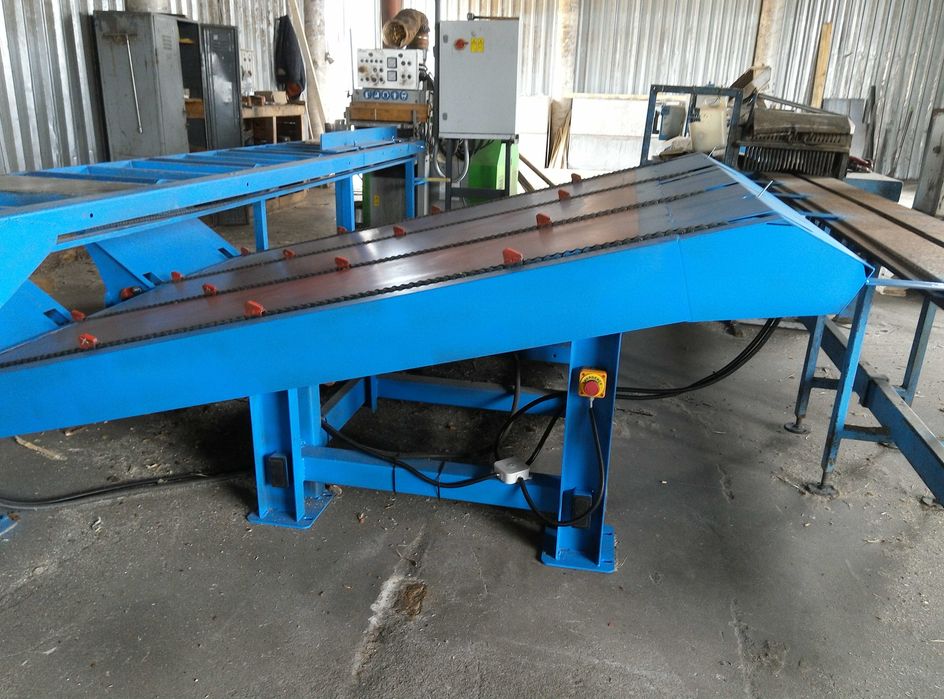 Część  podajnik  drewna kłody