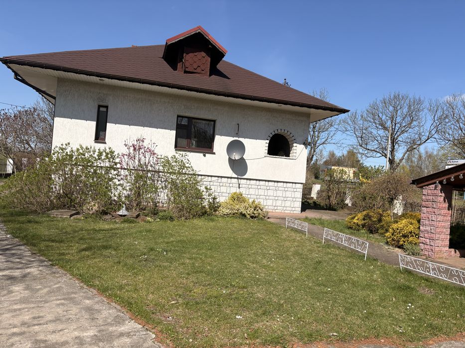 Dom ze stawem w Białkowie