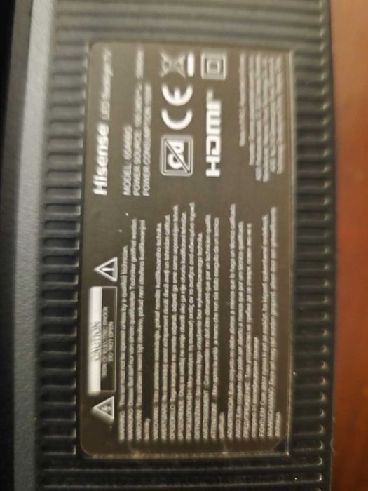 TV Hisense 65A6BG de 65 polegadas para peças ou reparação.