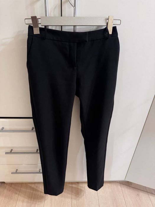 Женские брюки Imperial черного цвета , размера S