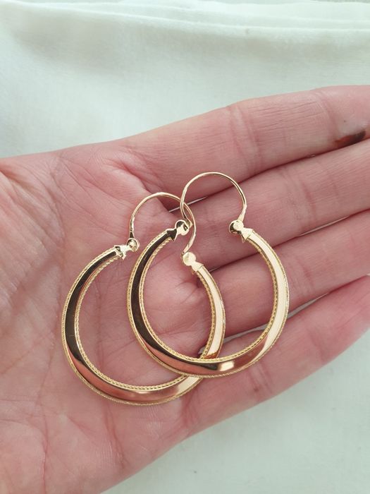 Argolas de ouro grandes