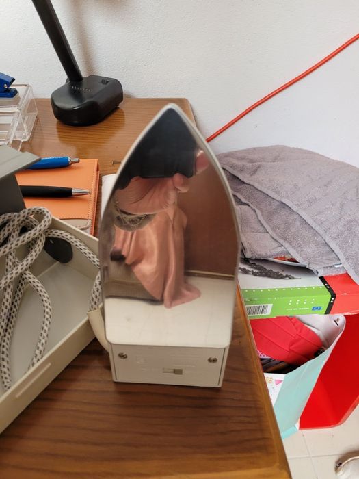 Ferro de viagem dobrável