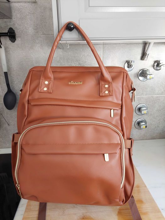 Mochila em pele sintética castanha – Prática e elegante