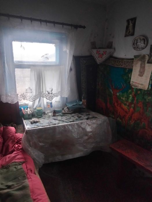 Земельна ділянка з будинком та прибудовами