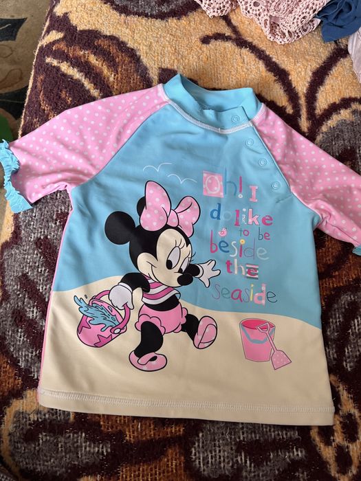 Подарую купальну футболку