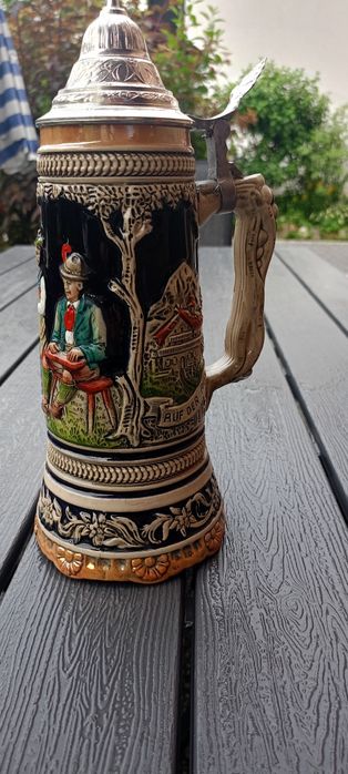 Piękny niemiecki  ceramiczny kufel z pozytywką