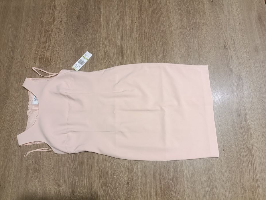 Акція!!!Рожева нова сукня,гарної якості.