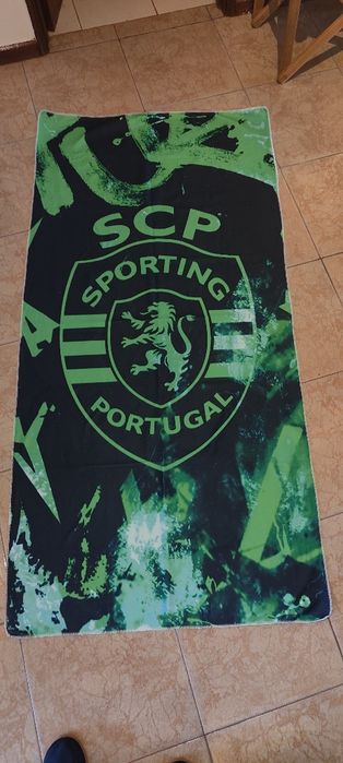 Toalha alusiva ao Sporting