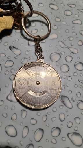 Брелок - календар на 50 років зі срібла, обертовий механізм