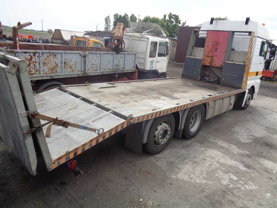 Transport maszyn pojazdów usługi transportowe Autolaweta Pomoc drogowa