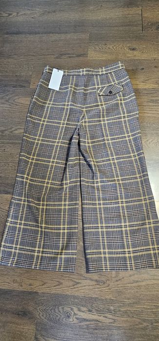 Nowe spodnie w kratę Zara rozm.XL