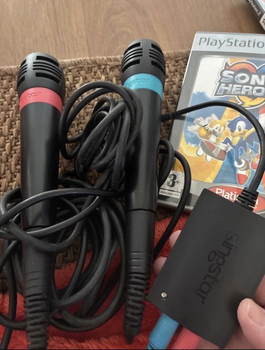 Playstation 2 com comandos e microfones