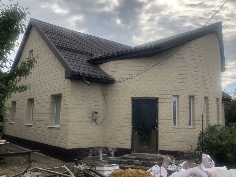 Утеплення фасаду термопанелями