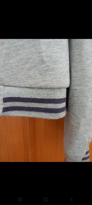 casaco cinzento criança