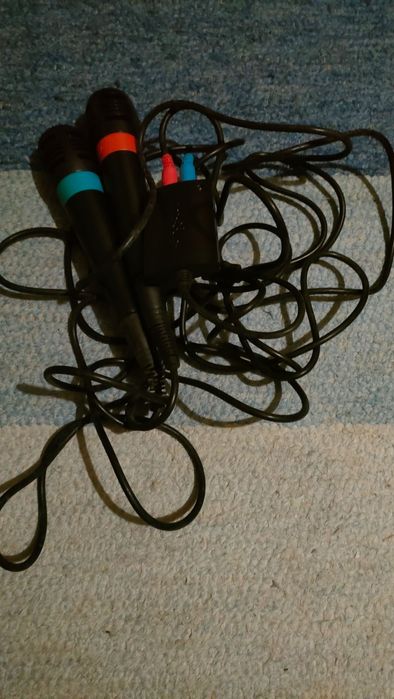 Pack SingStar PS2 — 4 jogos + 2 microfones USB