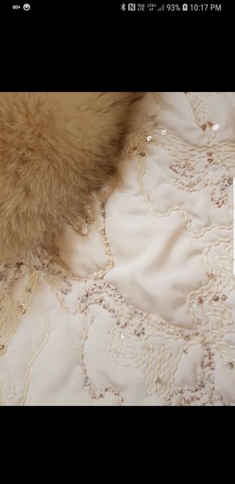 Kurtka damska krutka, ocieplana, z lisem, pikowana.