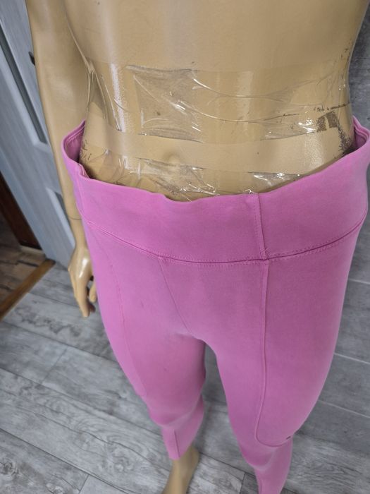 Leginsy różowe Nike rozm L