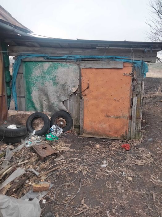 Земельна ділянка з будинком та прибудовами