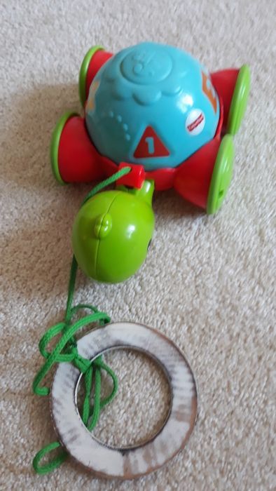 Jeżdżący żółw Fisher Price