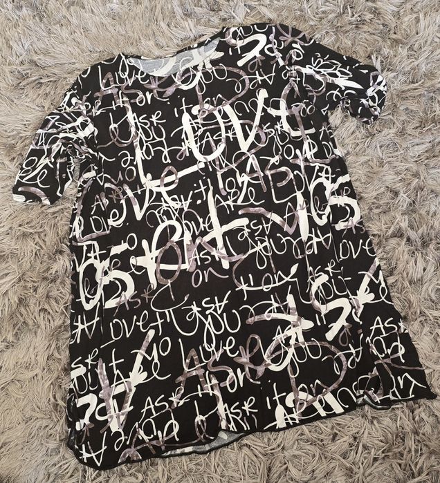 Modna bluzka w kwiatki rom.54