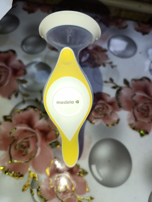 Механический молокоотсос