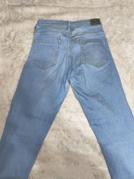 Calças de ganga estilo mom jeans