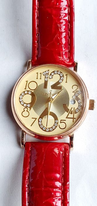 Продам золотые женские часы