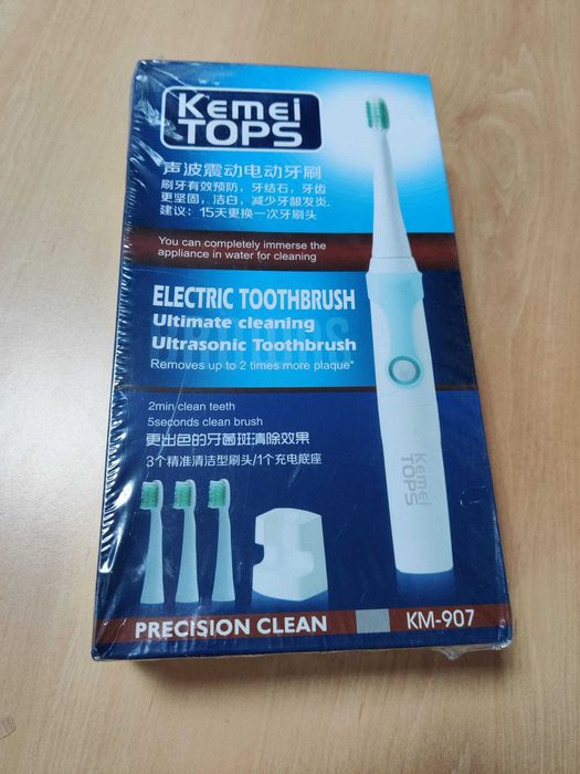 Escova de dentes elétrica Kemei Tops