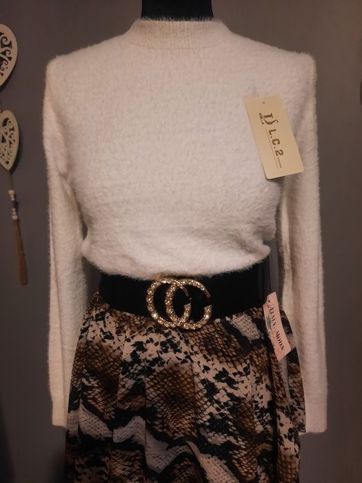 Nowy pasek na gumie czarny GG
Mam do sprzedania 
Nowy pasek beżowy GG