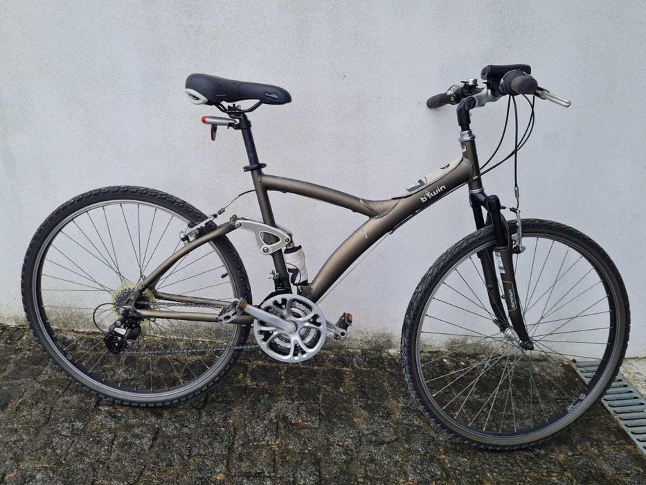 B'Twin 7 - Bicicleta Híbrida / Passeio com suspensão Total