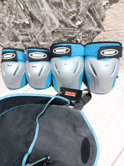 Продам ролики с наколенникамии