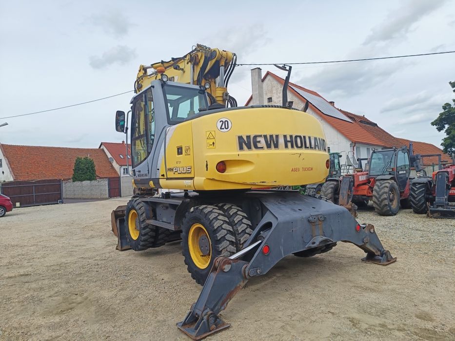 Maszyna budowlana koparka New Holland MH Plus  Ramie LONG