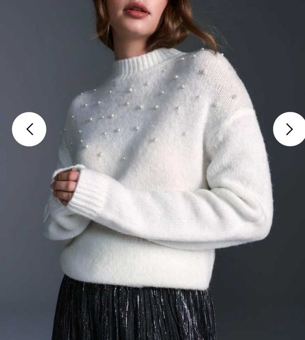 Sweter z ozdobnymi perełkami