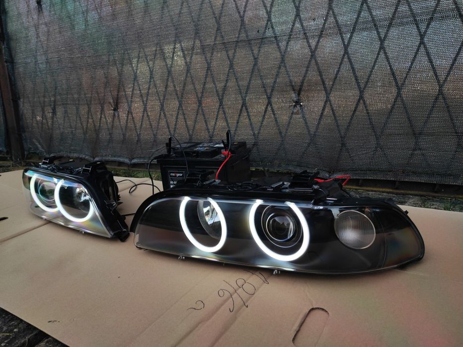 BMW E39 Lampy BiLED BLACK NOWE Hella Regeneracja Ringi Mocne światło!
