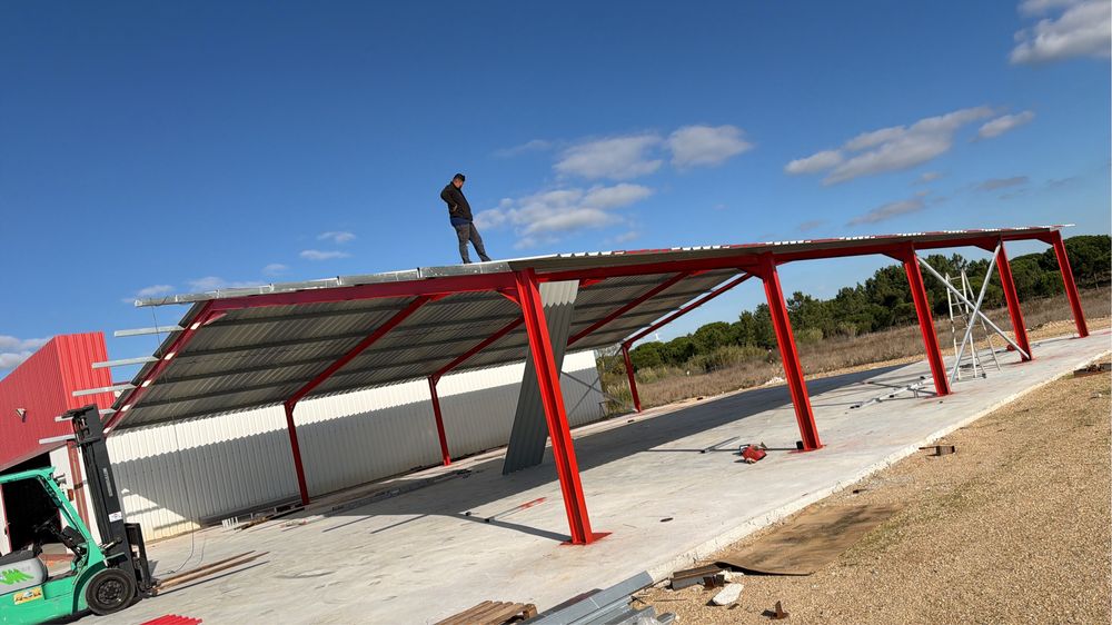 Armazens em viga I e chapa galvanizada ou sanduiche