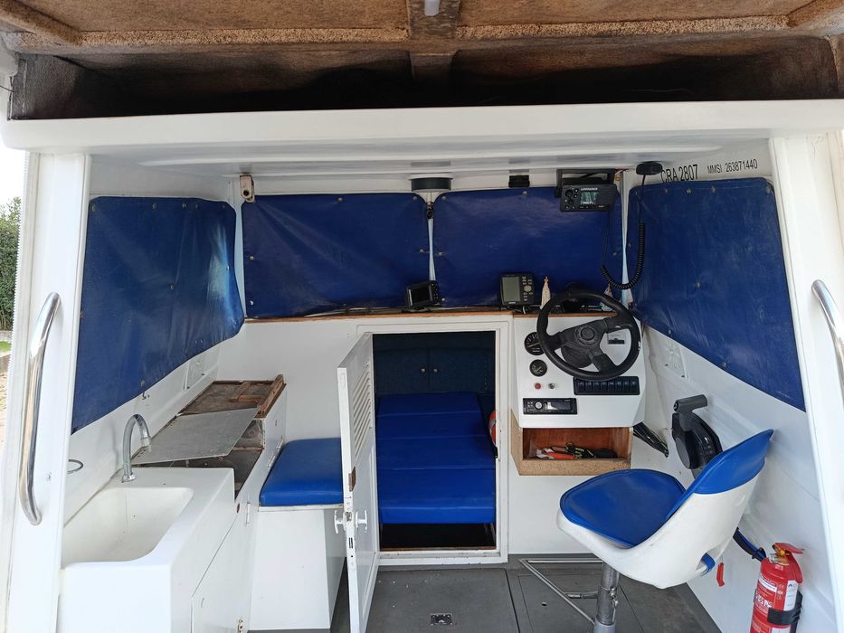 Barco cabinado 6mts