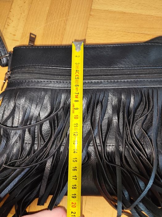 Mała listonoszka z frędzelkami